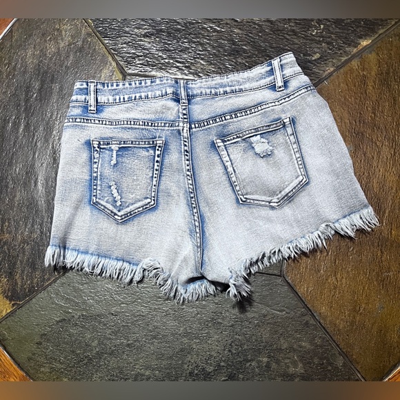 Short shorts.  Worn denim Size Large.  Stretchy.  3” inseam. Preowned. Buttonfly - Picture 6 of 7